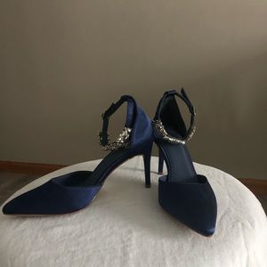 Never worn, 3-1/2 inch heel